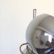 Eyeball floor lamp in chromed metal