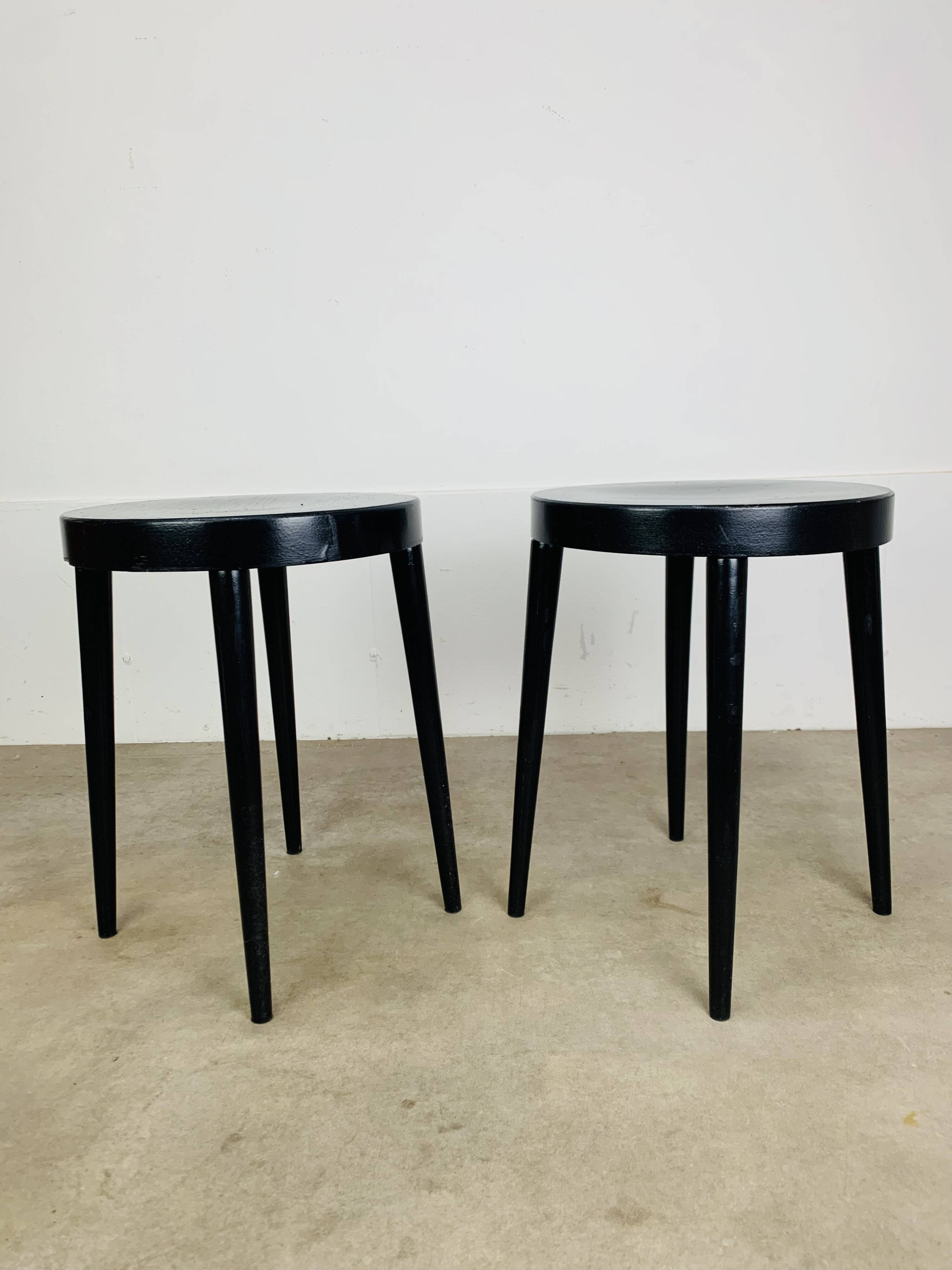 Pair of black Baumann stools, 1960s