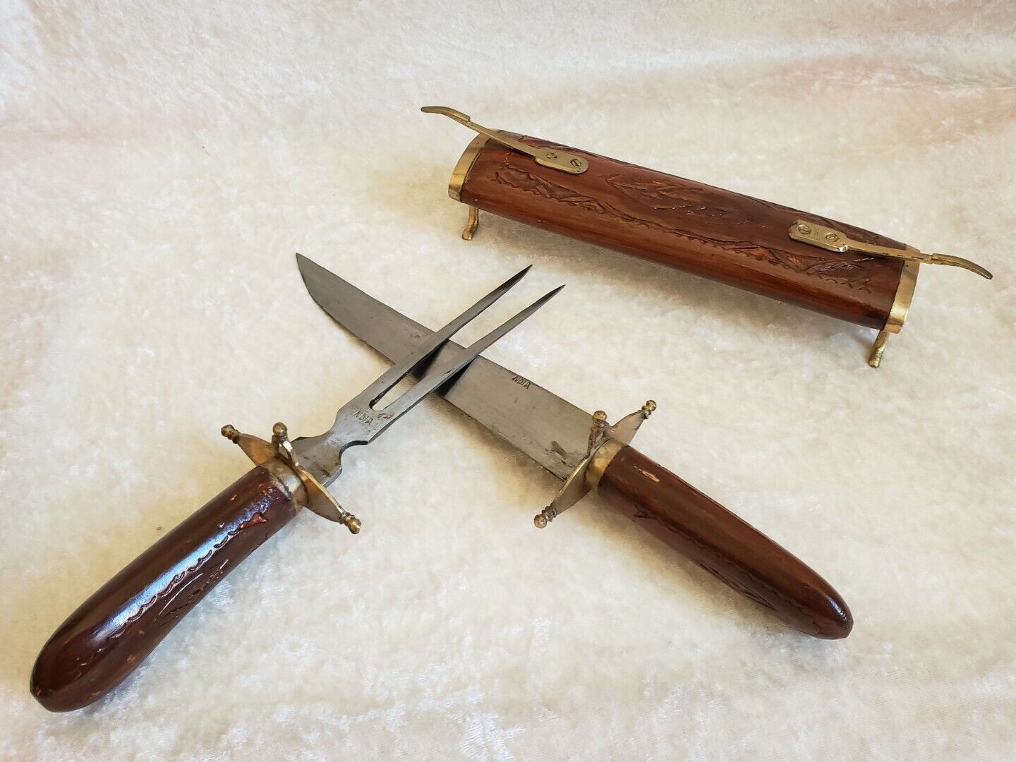 Vintage cutting service with knife and fork in wooden sheath