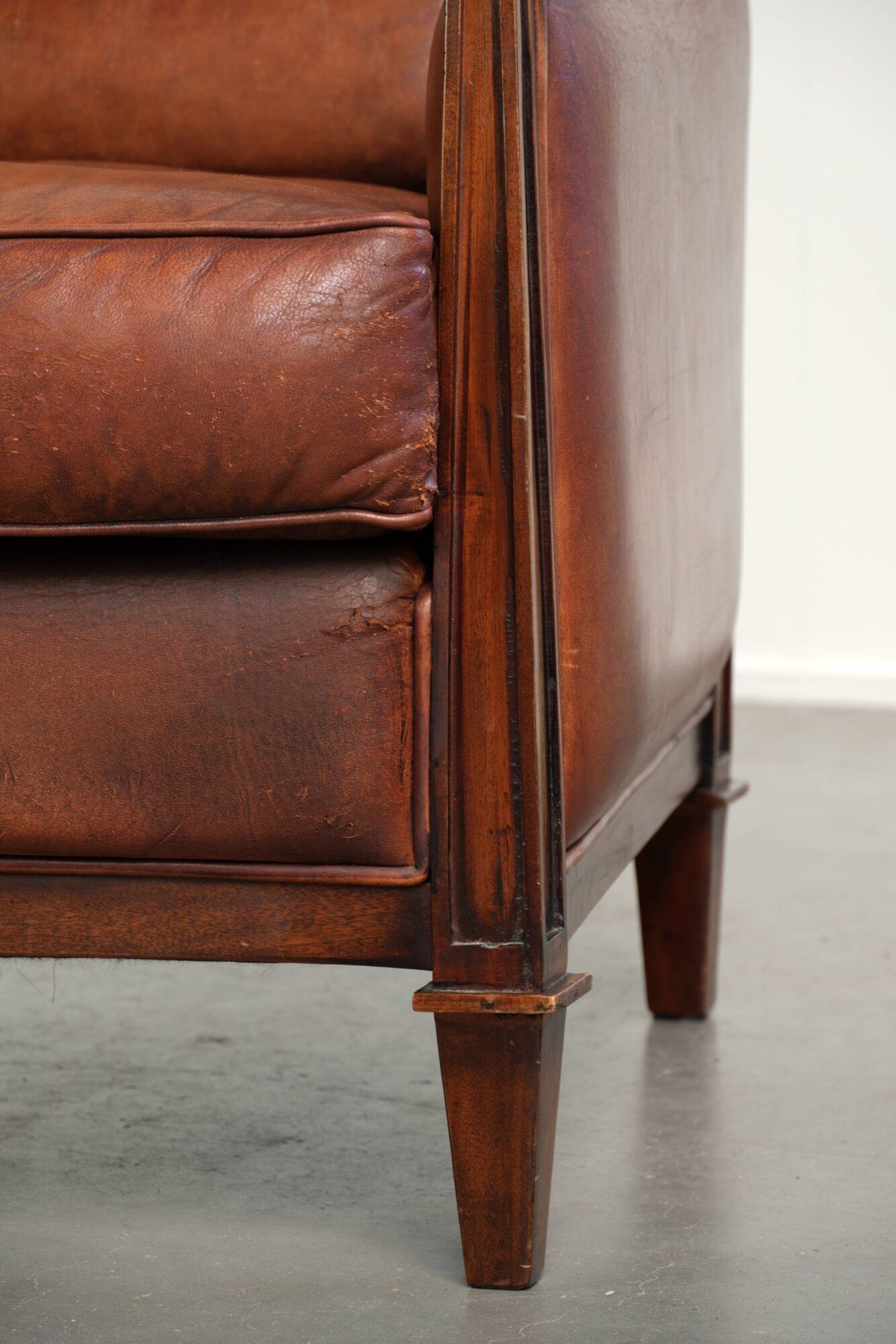 Sheepskin Art Deco design armchair with a comfortable seat and warm colours