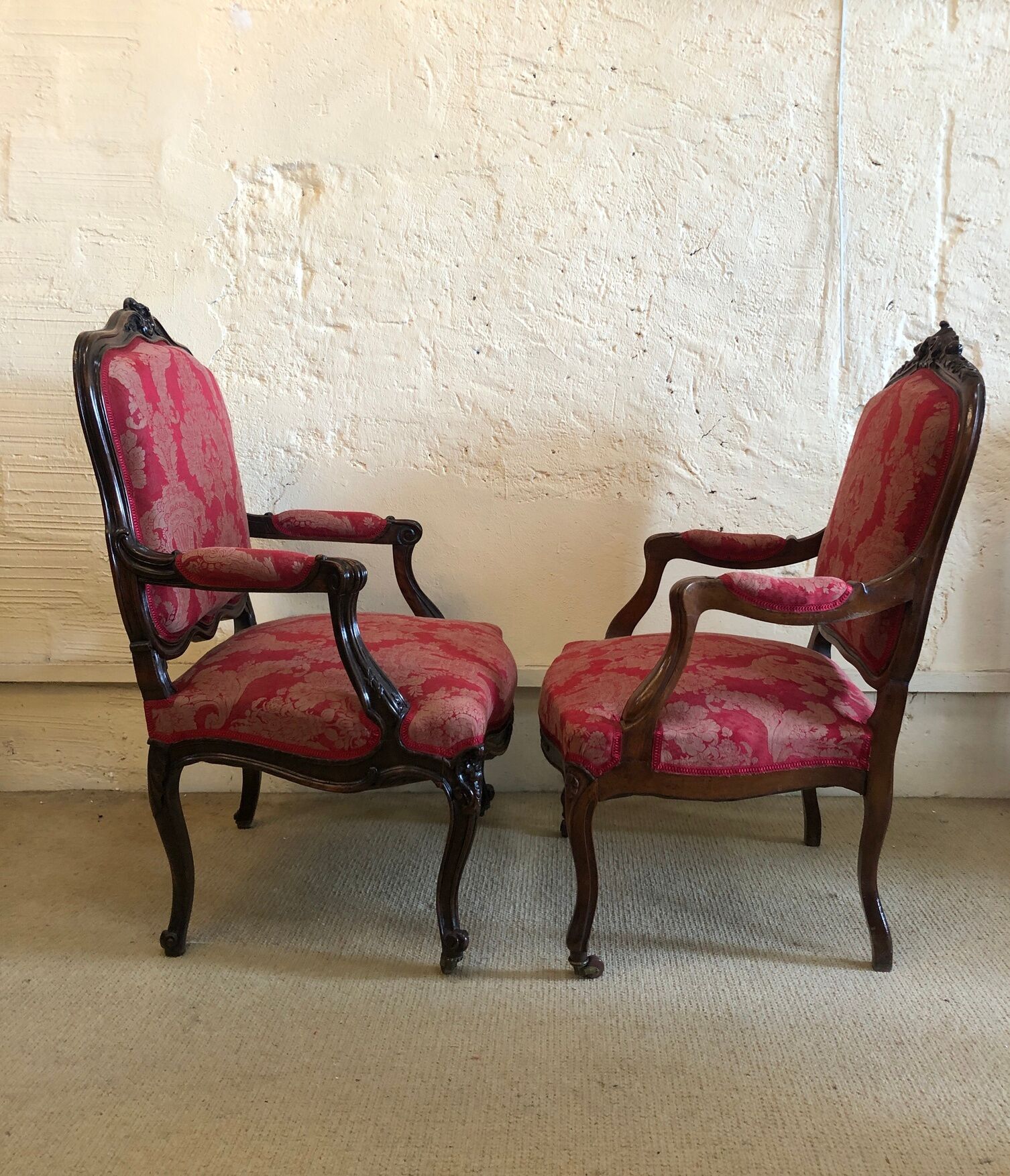 False pair of Louis XV style armchairs, nineteenth century