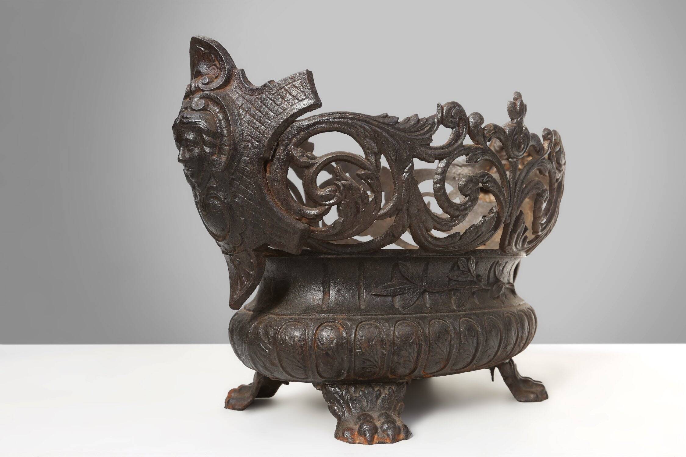 Cast Iron planter decorated with masks and lion paws, France 1850s