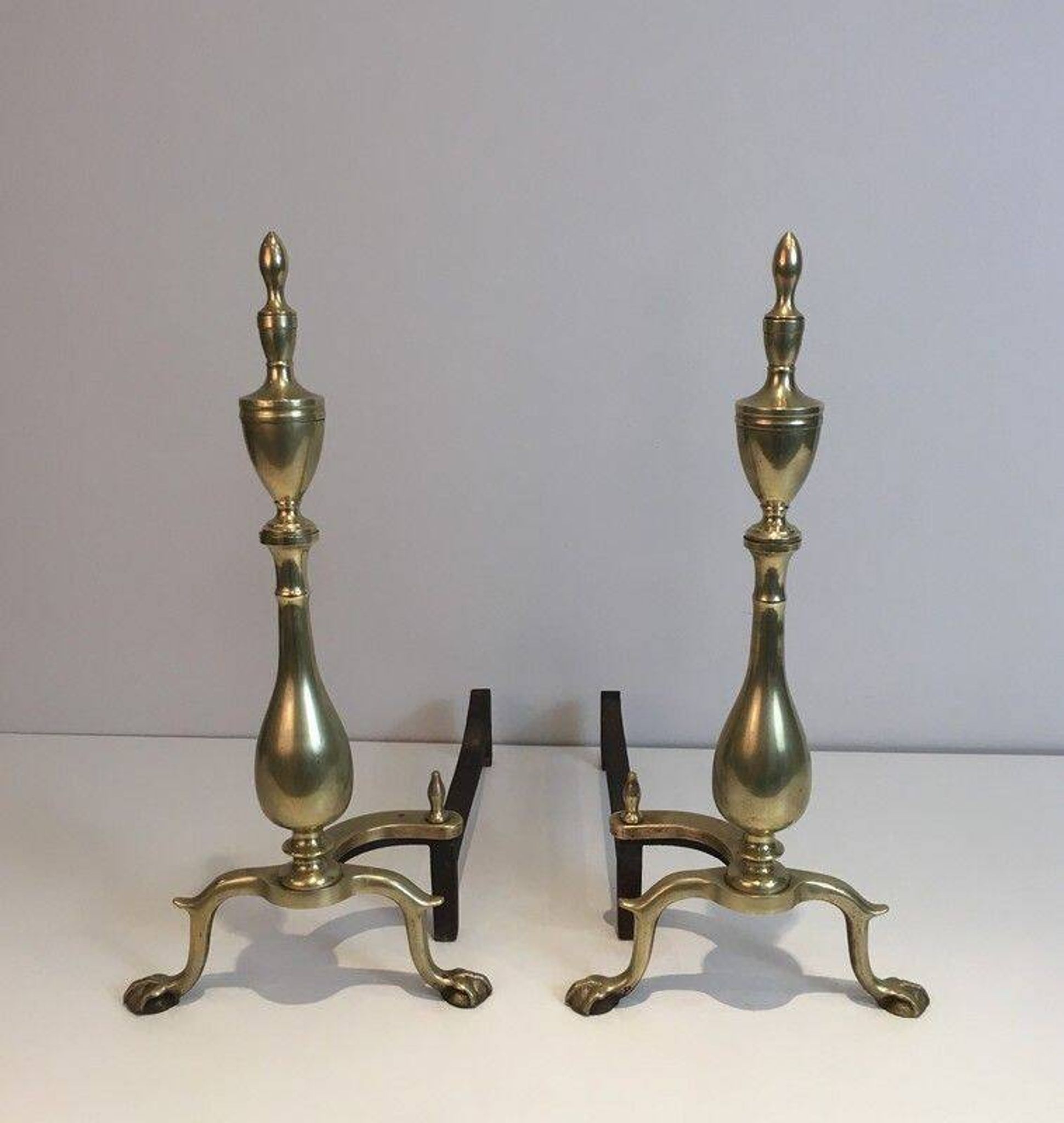 Pair of neo-Gothic bronze and wrought iron andirons
