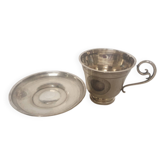 cups and saucers in solid silver