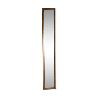 Long wooden mirror and gilded stucco with pearl rays H: 2m45 L: 40cm