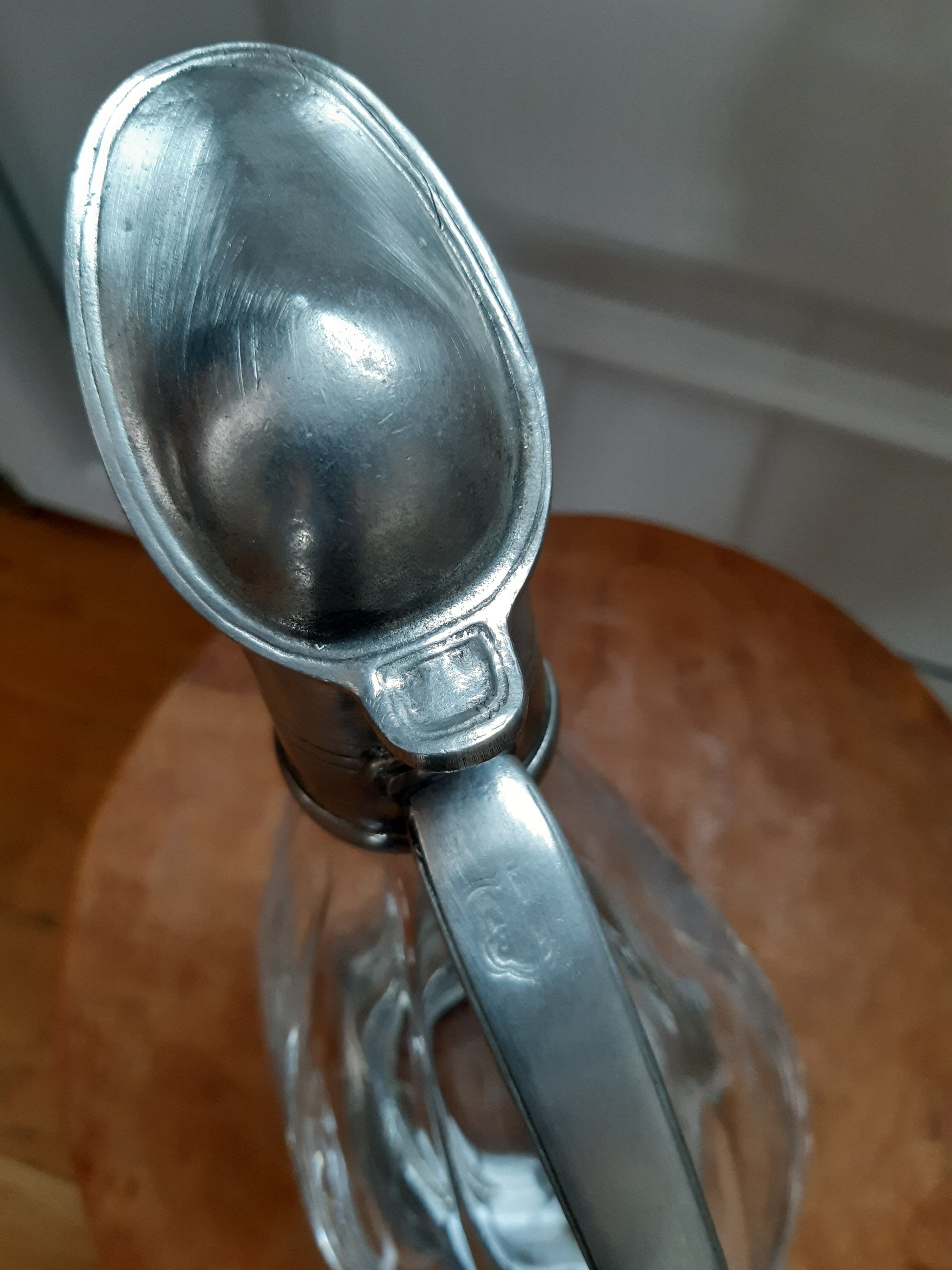 Old duck carafe in crystal and tin