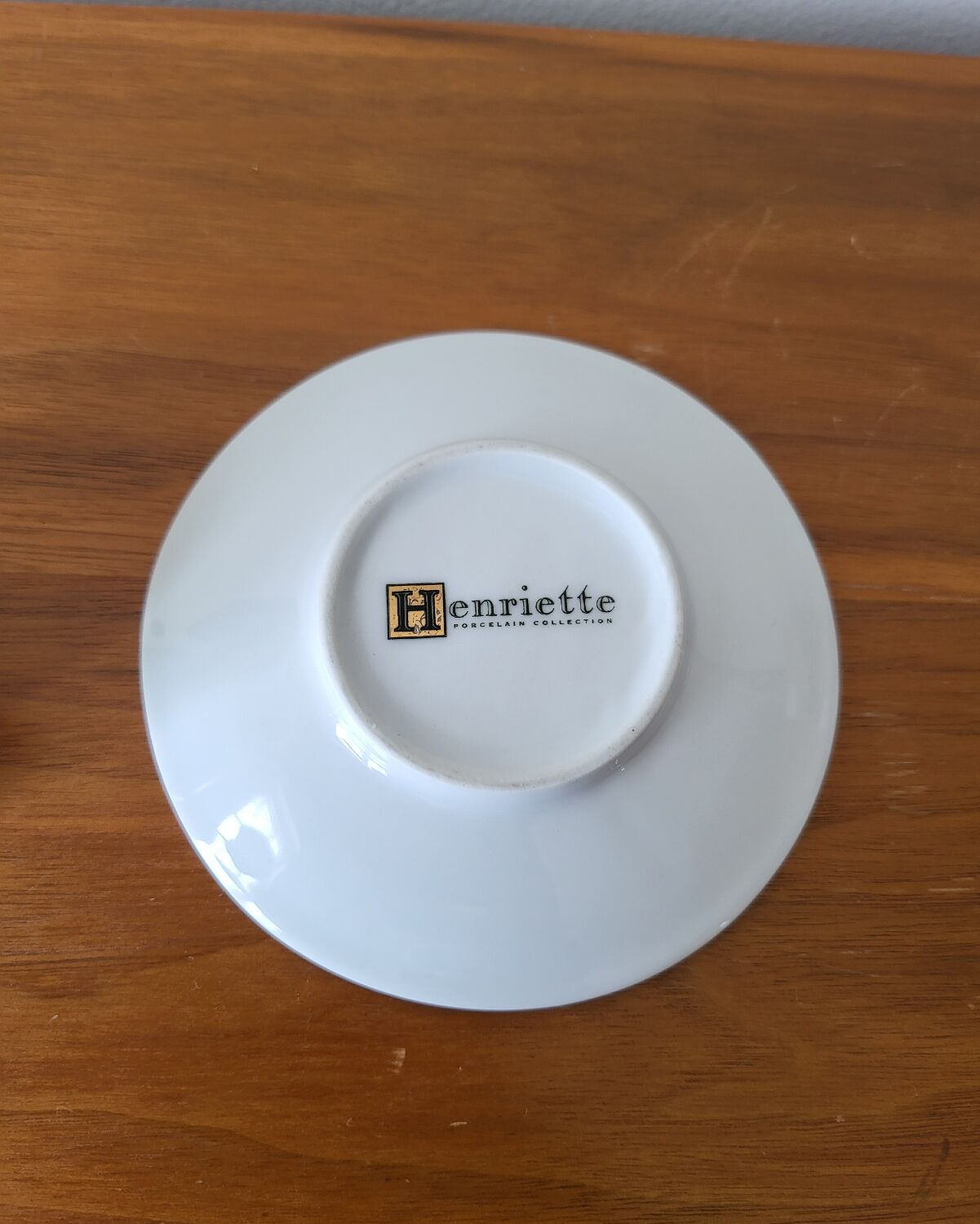 Cup and saucer in porcelain Henriette Bee pattern