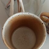 Coffee pot and mug cup in sandstone