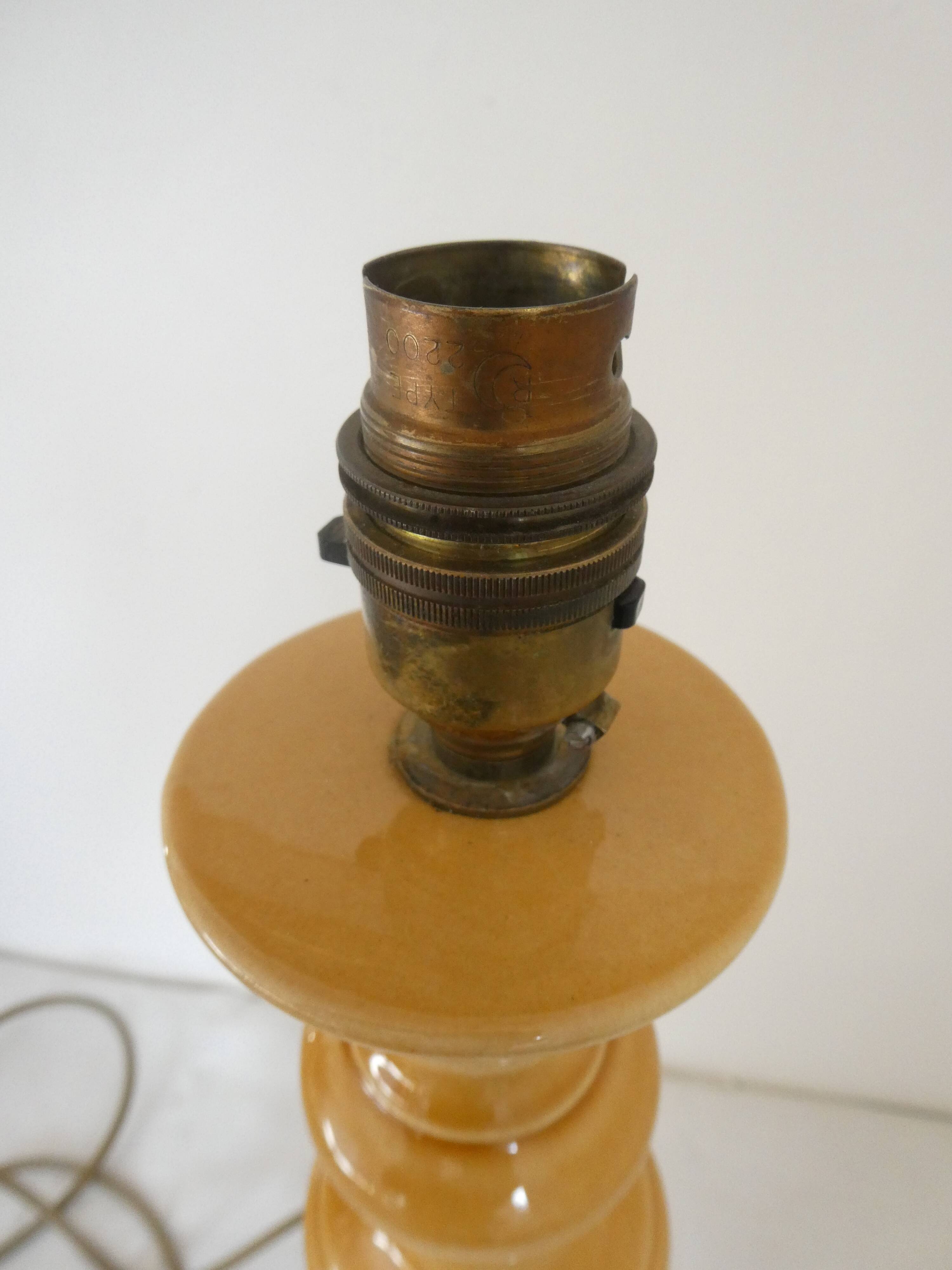 Large baluster-shaped lamp base in yellow and beige ceramic from the 1960s.