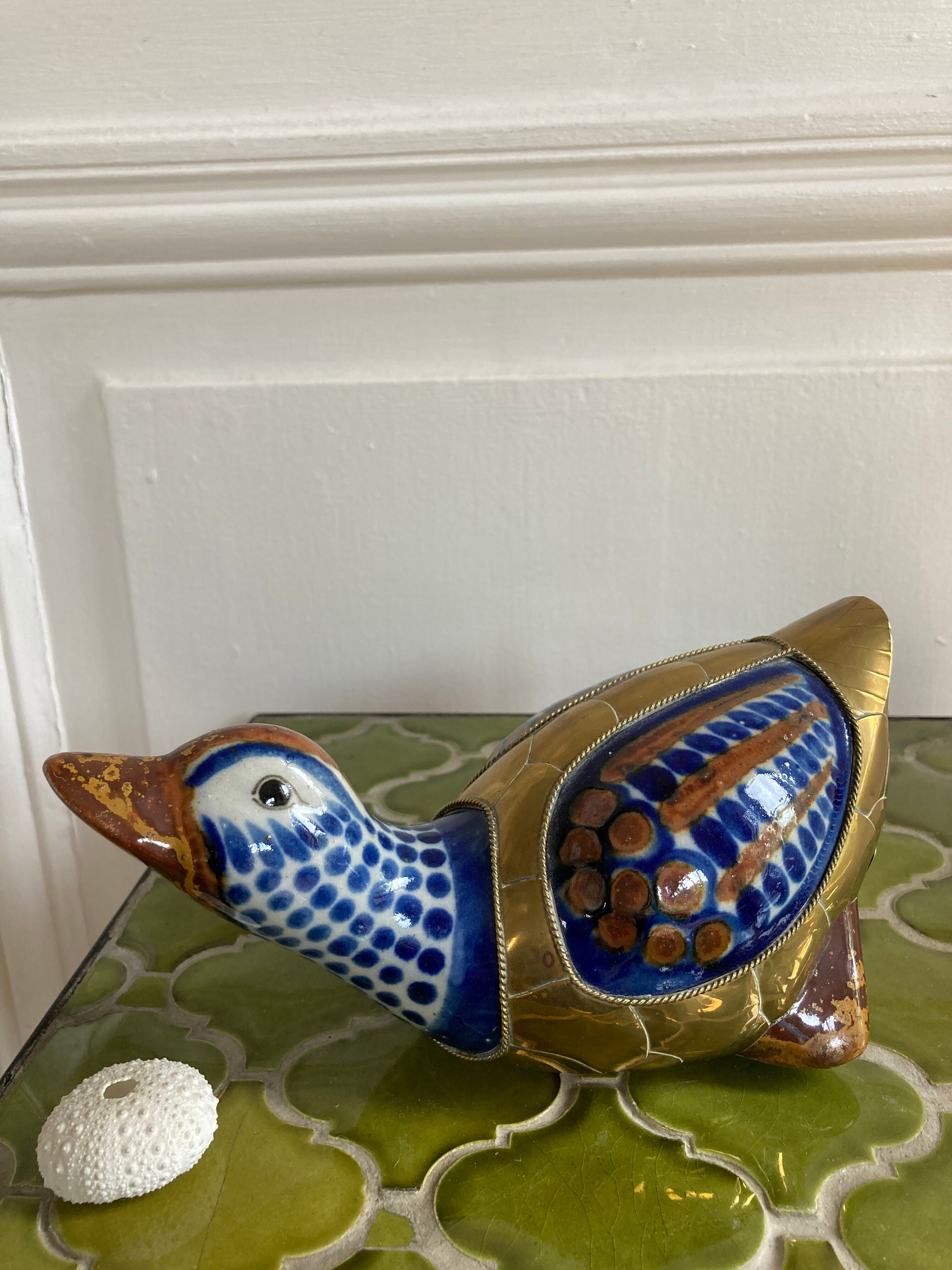 Brass duck and ceramic