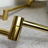 Two wall lights with articulated arm in gold metal Egolux