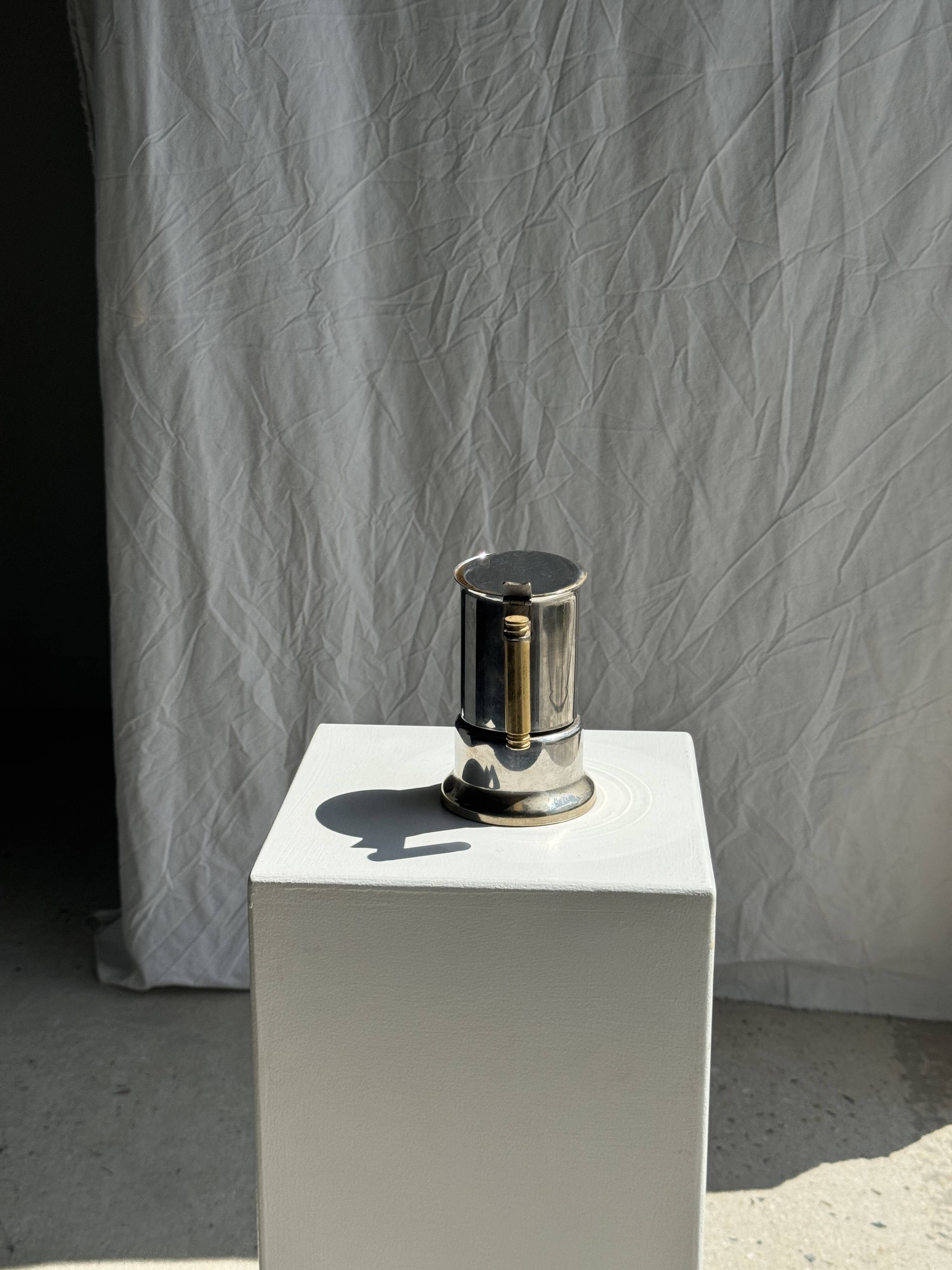 Small silver and gold Italian coffee maker Alpu-F Puppieni in stainless steel