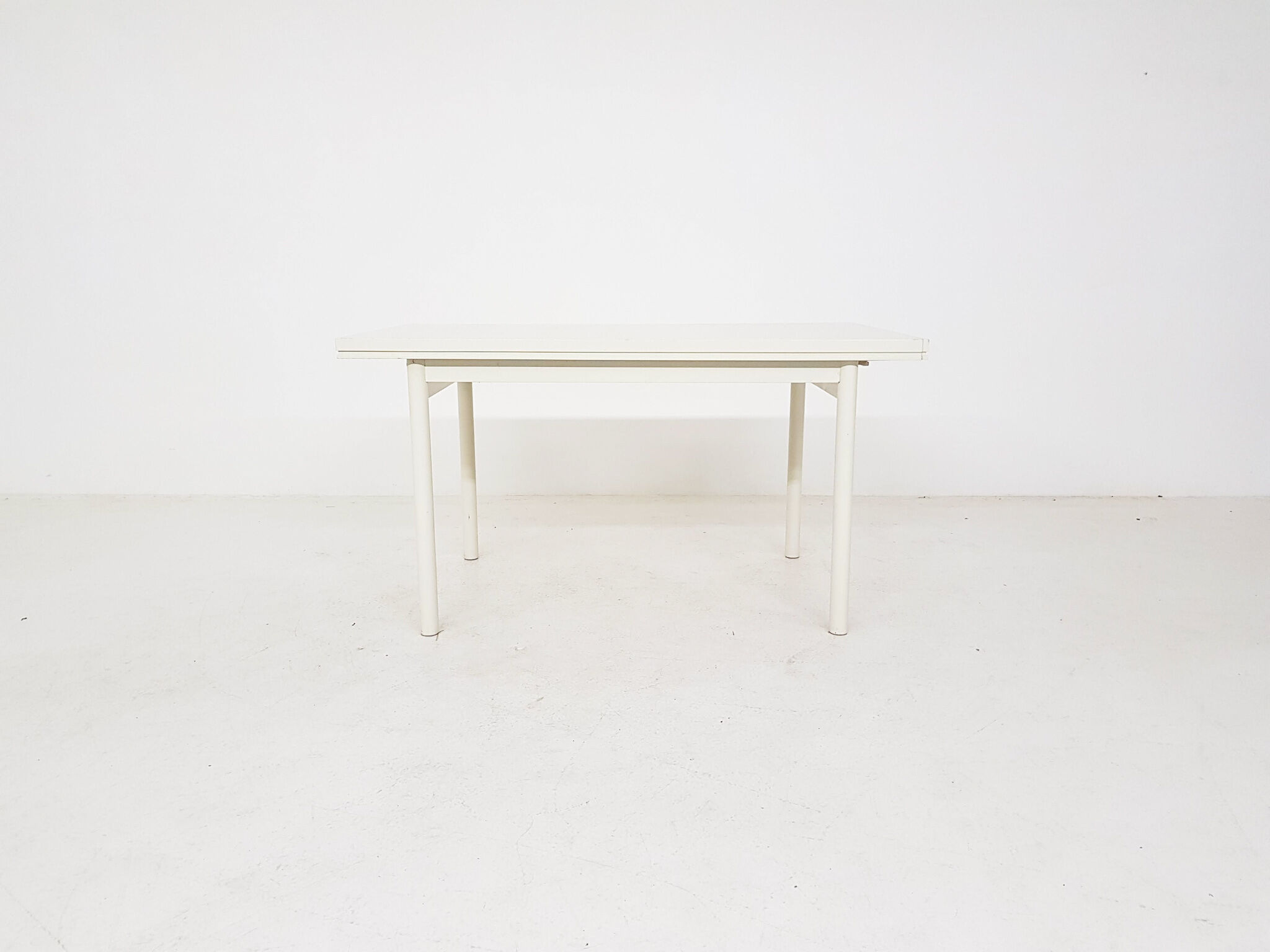 Beige extendable wooden table