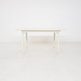 Beige extendable wooden table