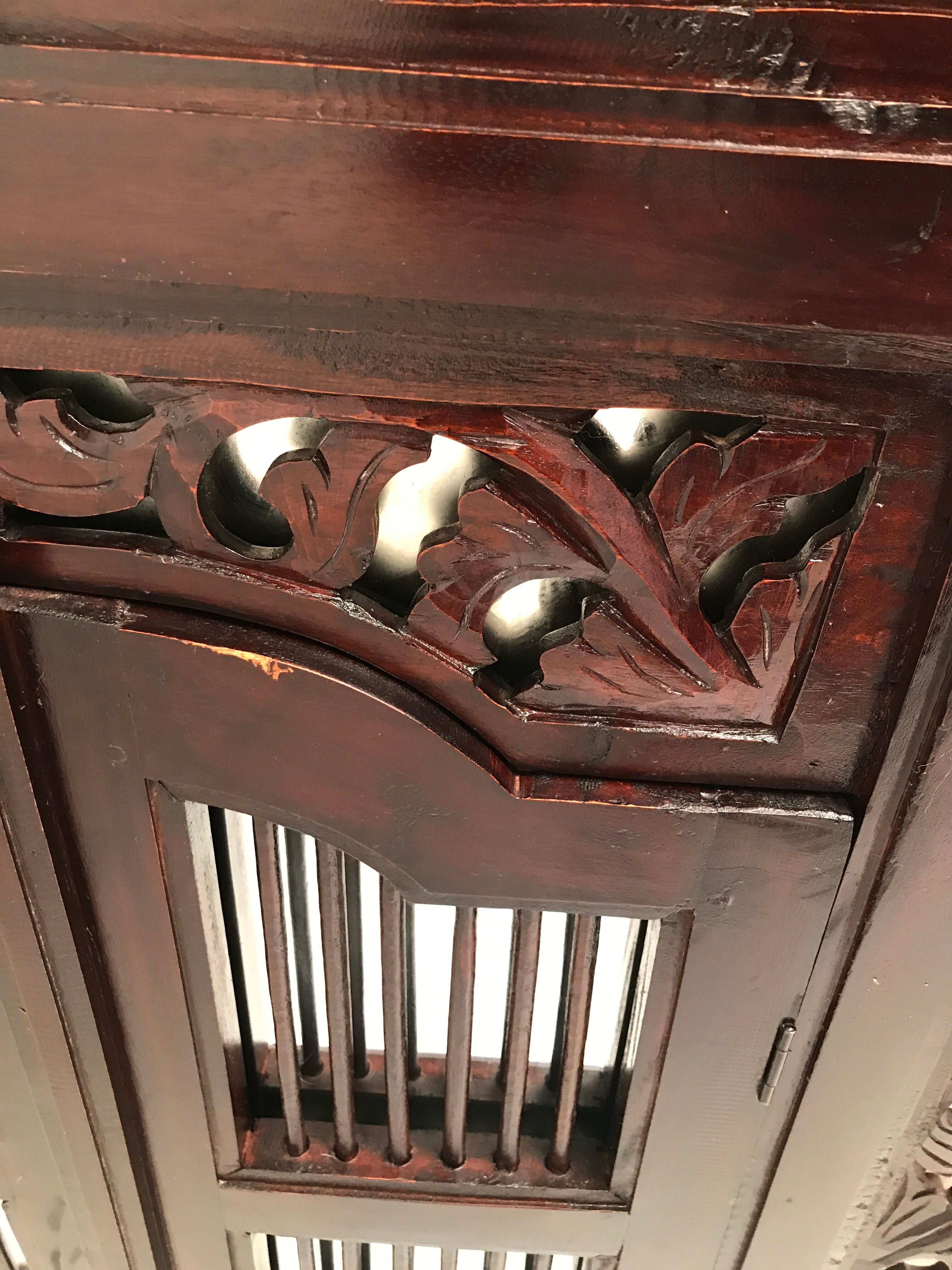 Vintage shuttered Indonesian mirror