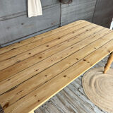 Old farmhouse table in raw wood