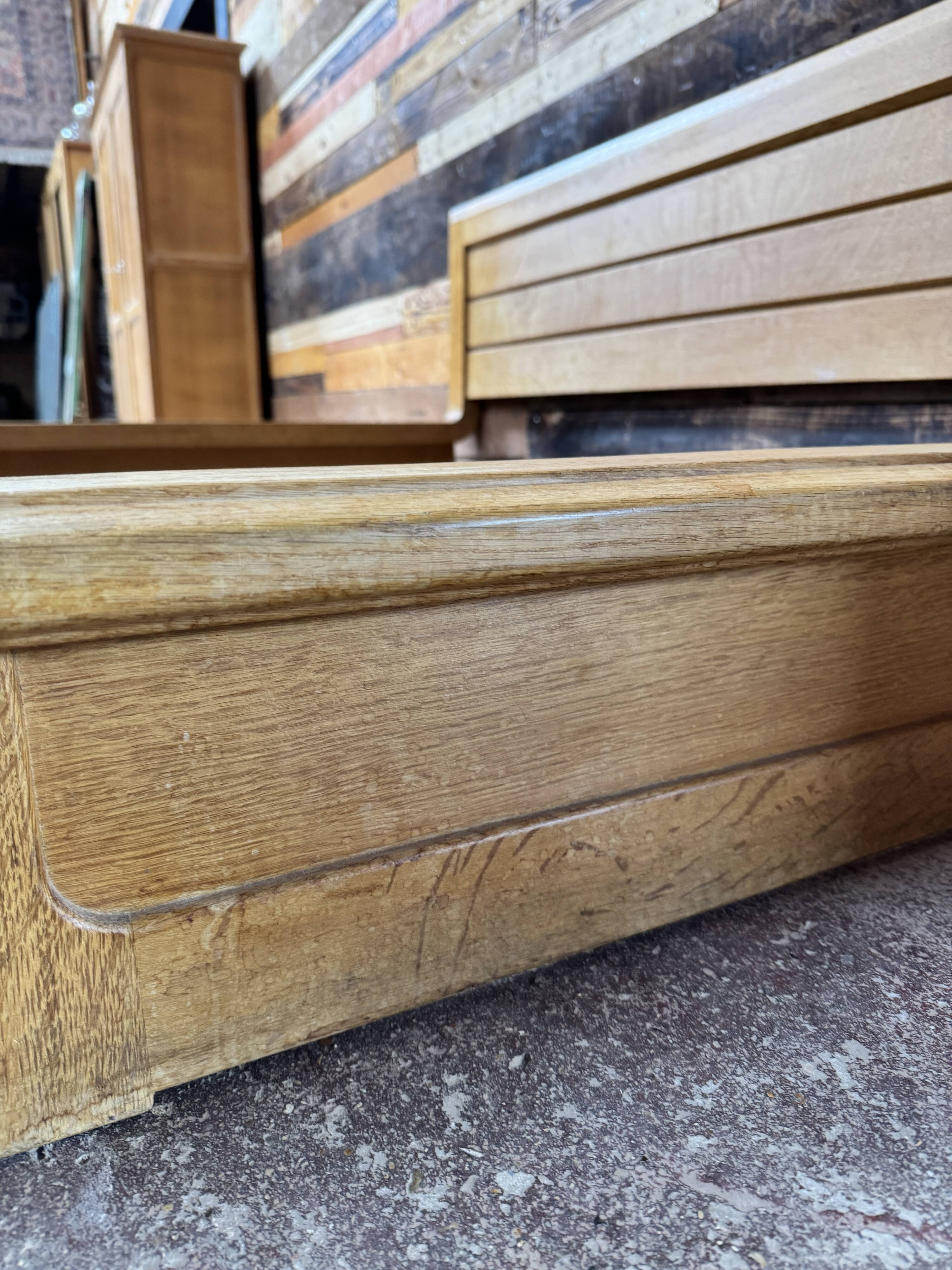Sculpted oak bed by Guillerme & Chambron