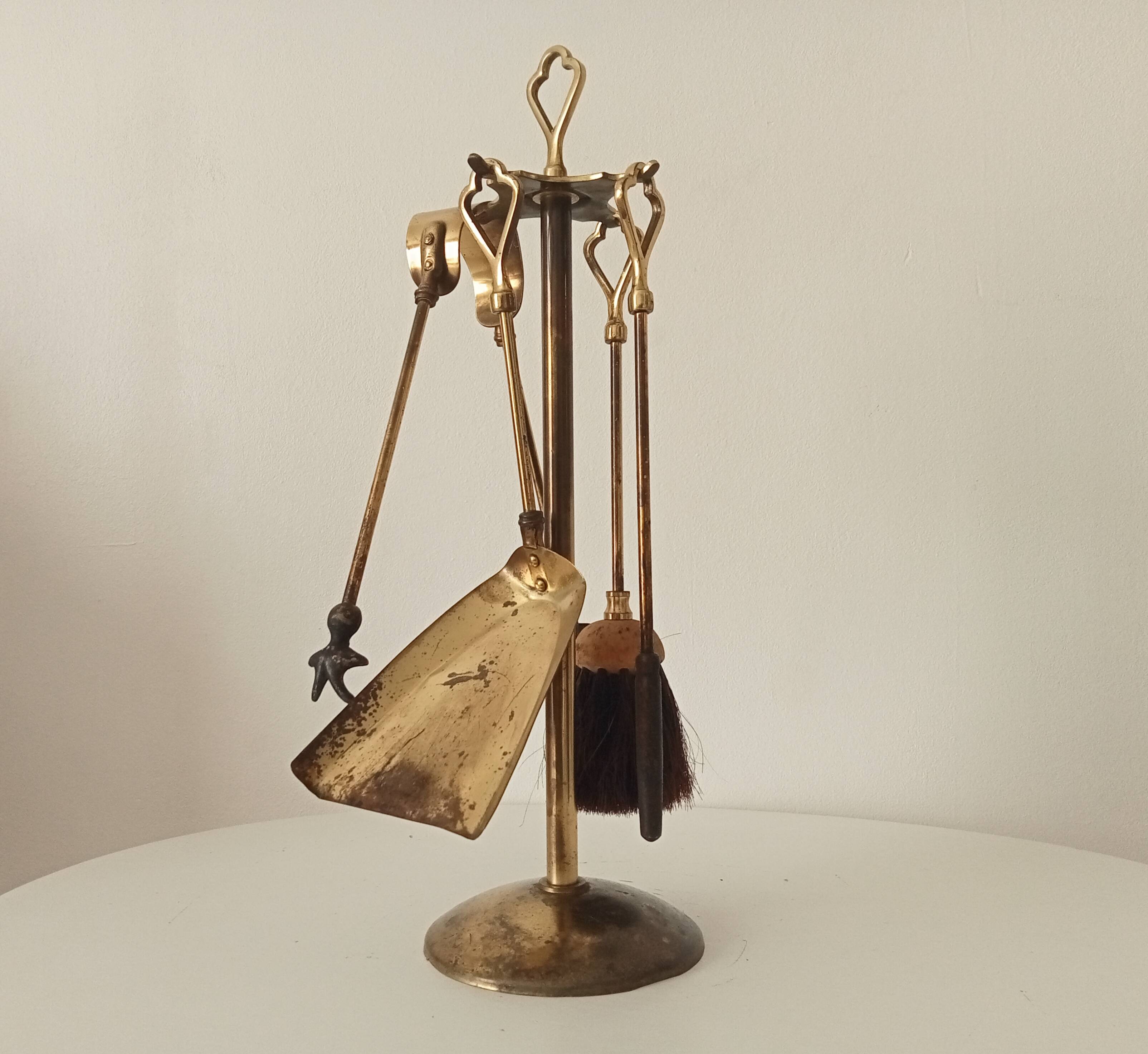 Old brass fireplace servant