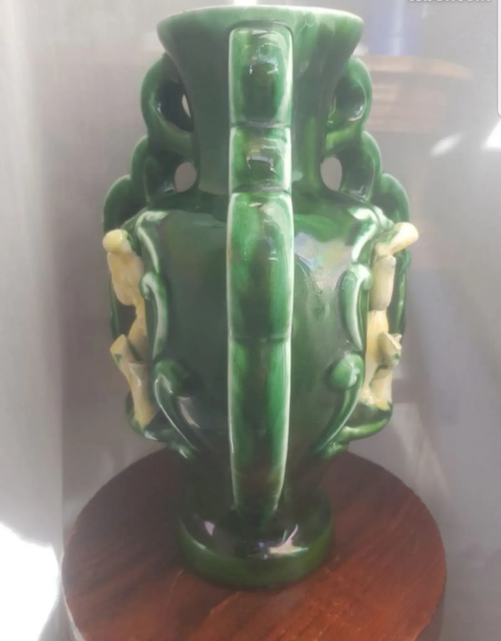 Earthenware vase with 3 caryatids
