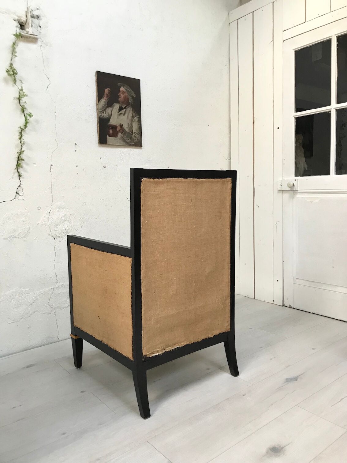 Pair of blackened wooden armchairs