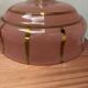 Pair of white ceramic wall lights with pink glass
