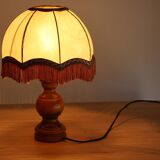 Table lamp in turned wood and umbrella-style leather lampshade