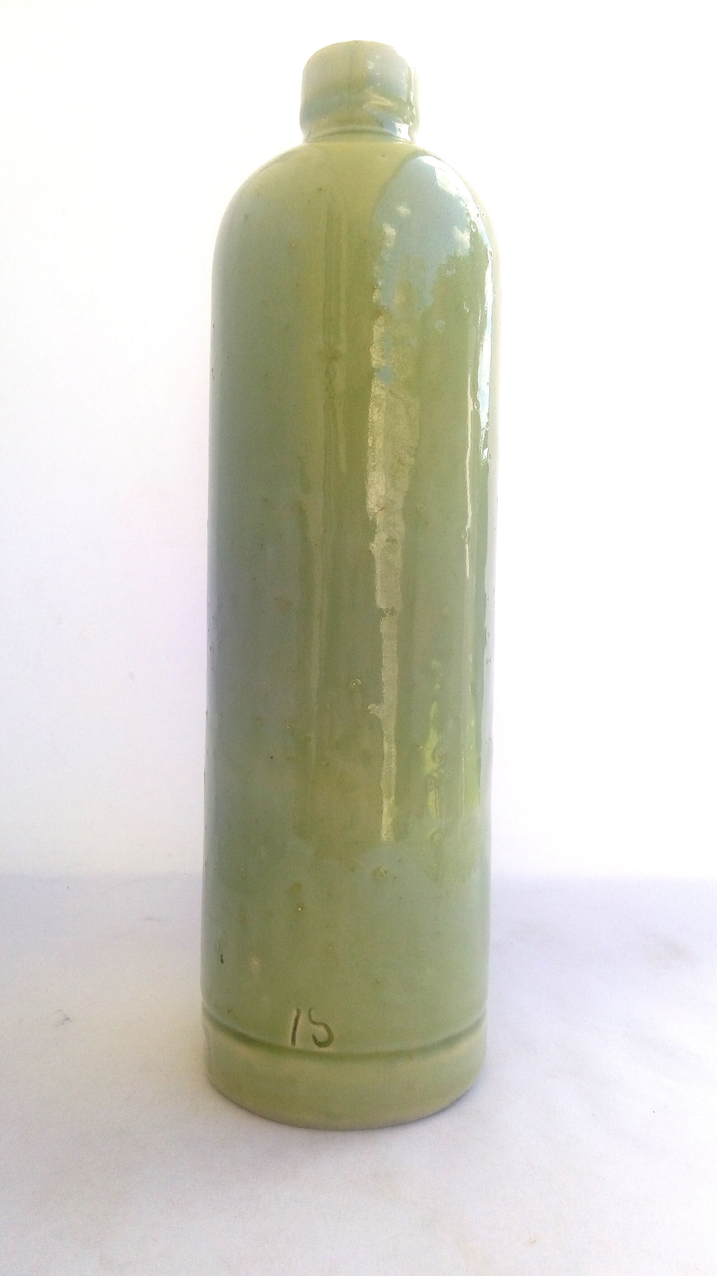 Apple green enamelled sandstone bottle