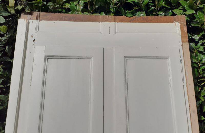 Pair of 19th-century cupboard doors and frame, woodwork