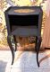 1930 bedside table, repainted wood in black with a golden rose motif.