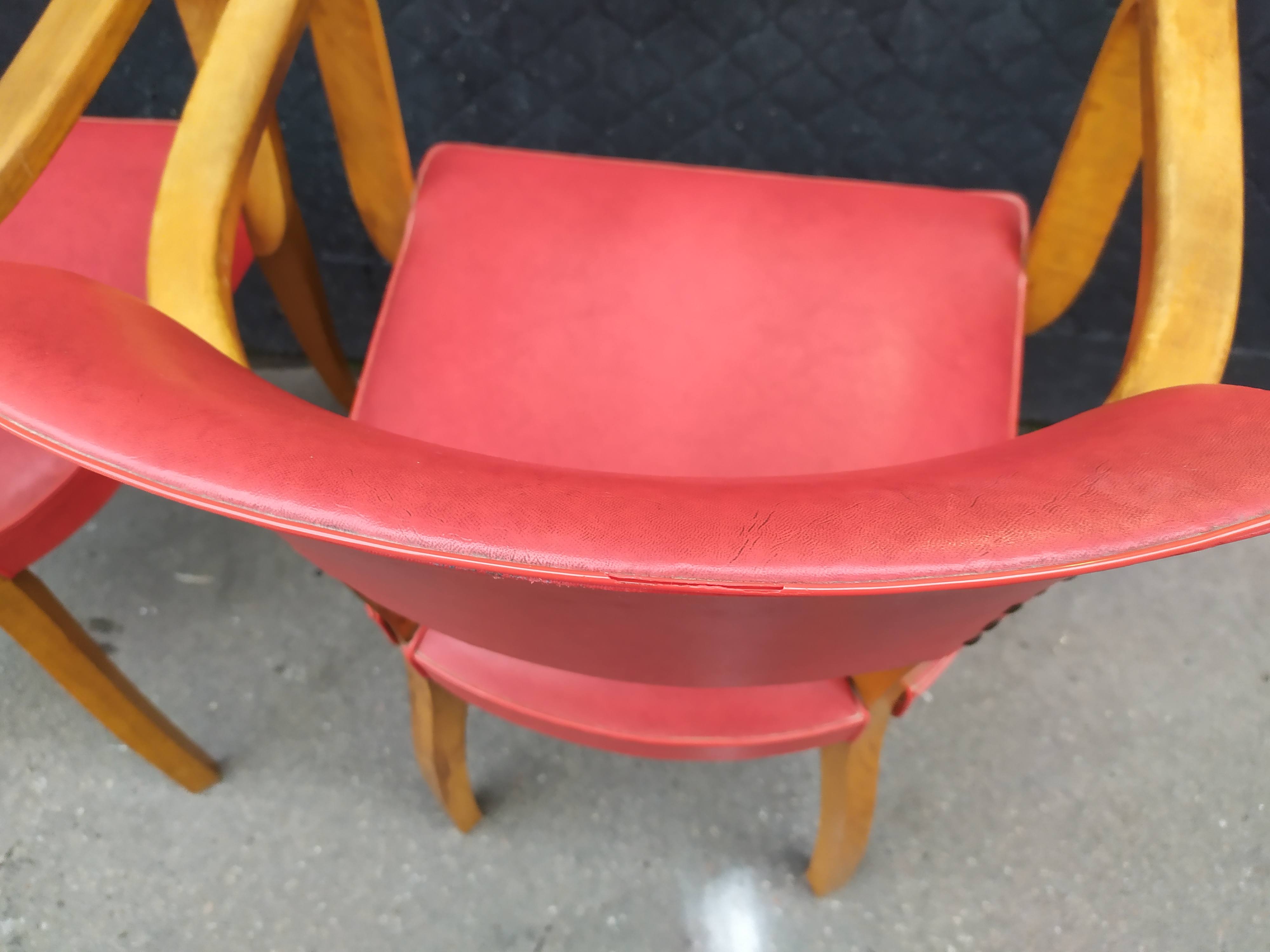 Pair of red vintage bridge armchairs