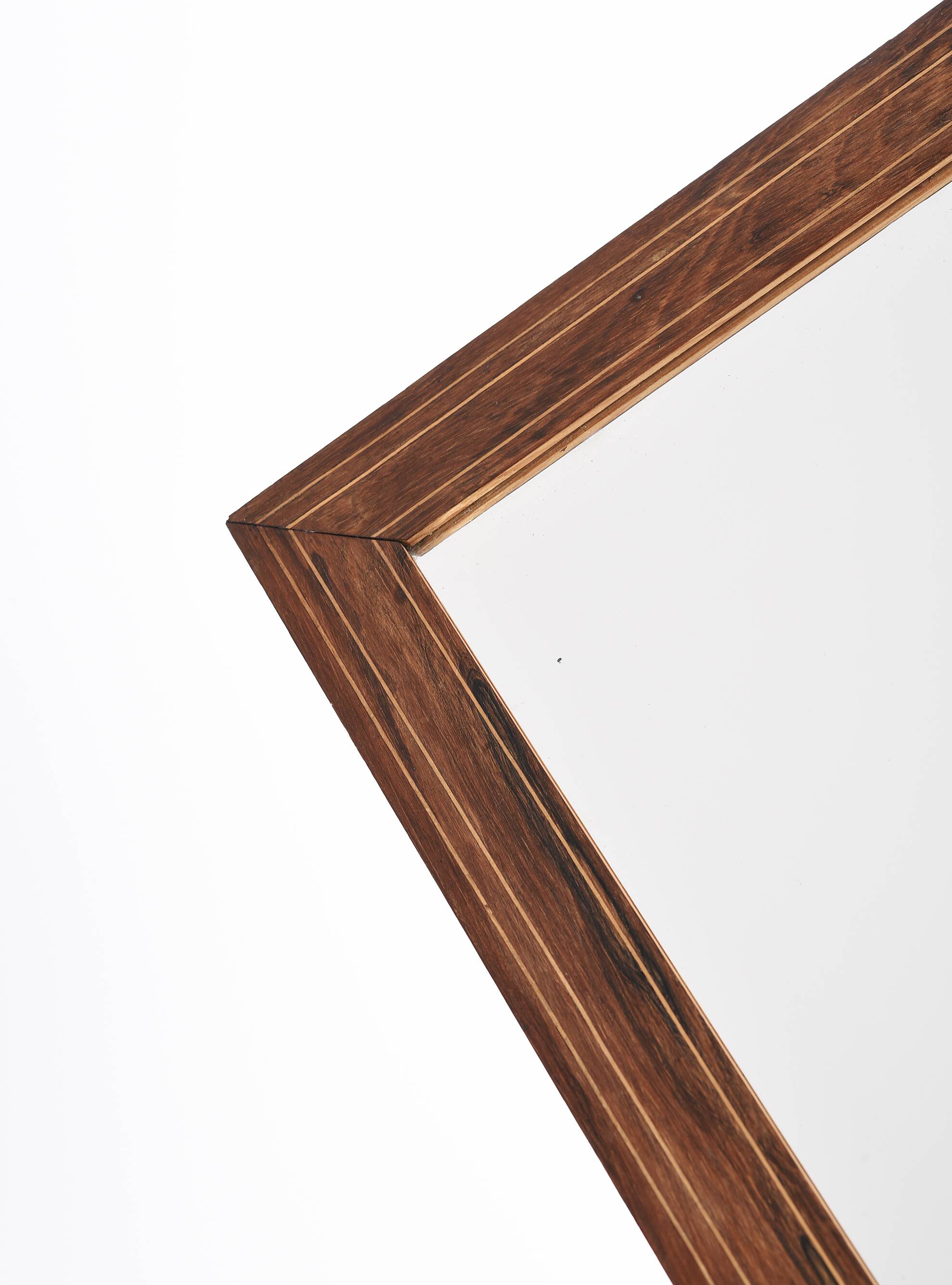 Old rectangular wooden mirror, frame decorated with edges
