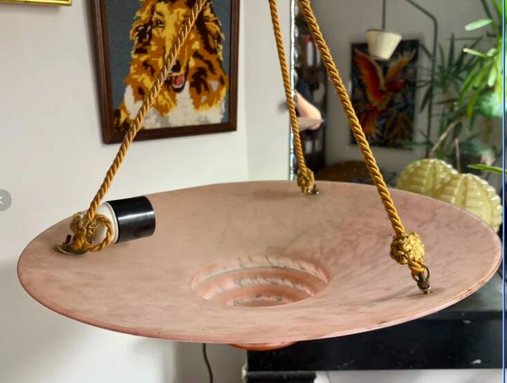 Art Deco basin suspension with pink glass and fabric cords.