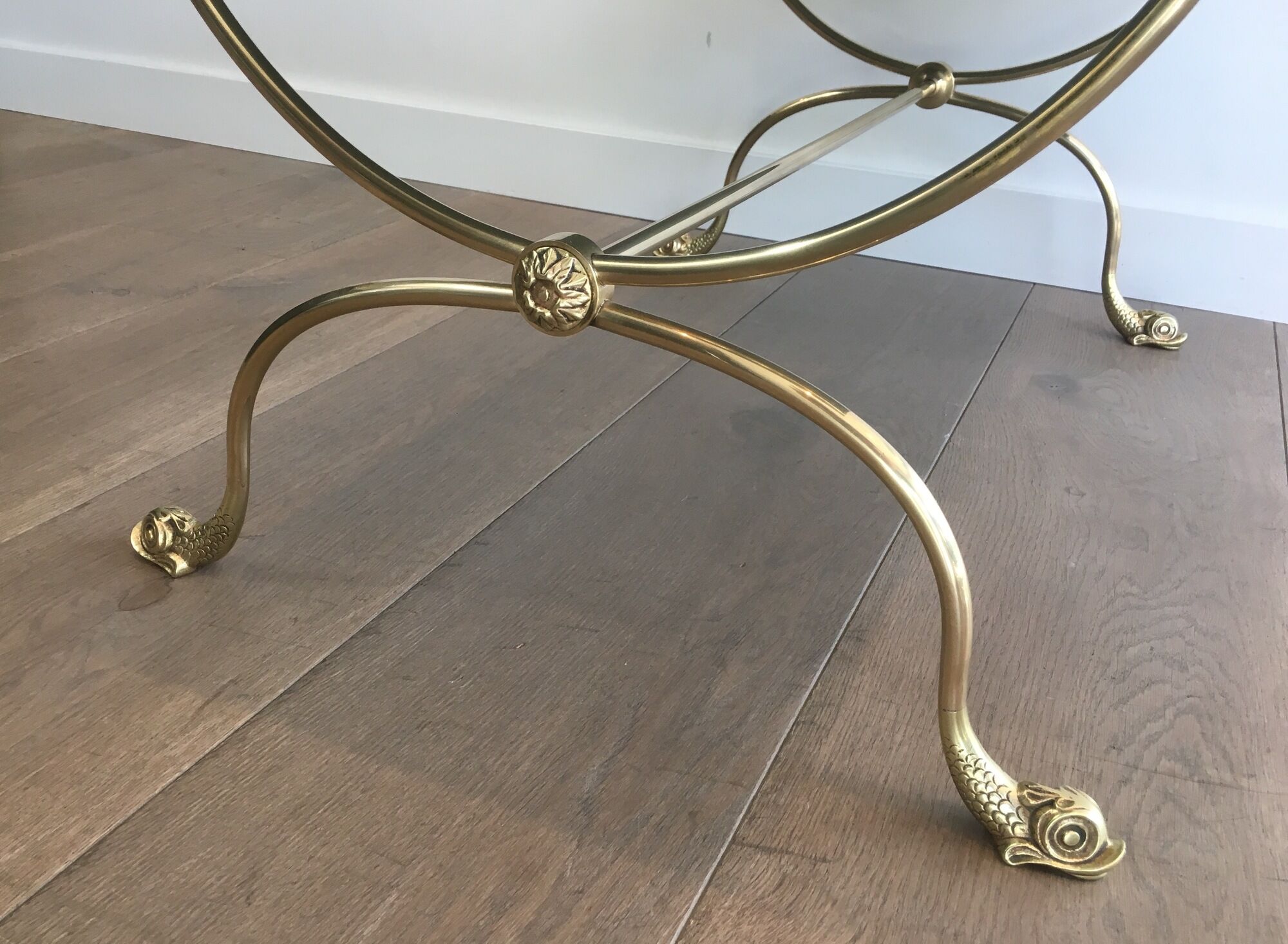 Neoclassical brass style coffee table with dolphin head decoration
