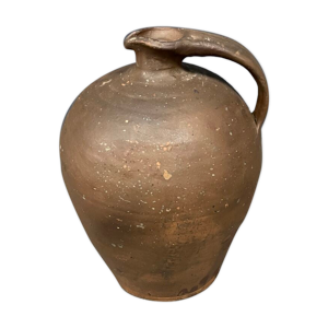 Cruche antique en poterie marron