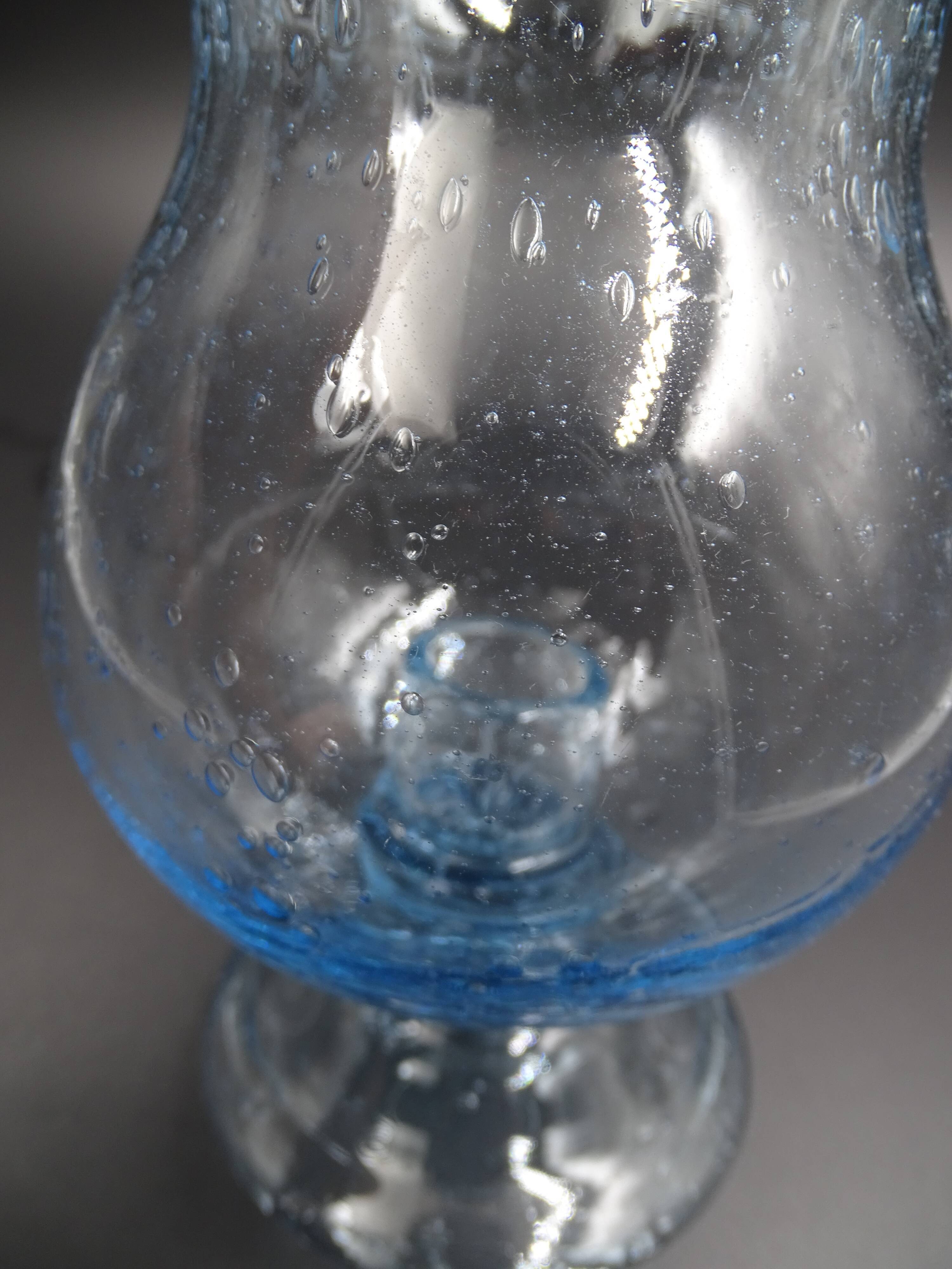 Candlestick or photophore in sky blue bulled glass, signed Biot