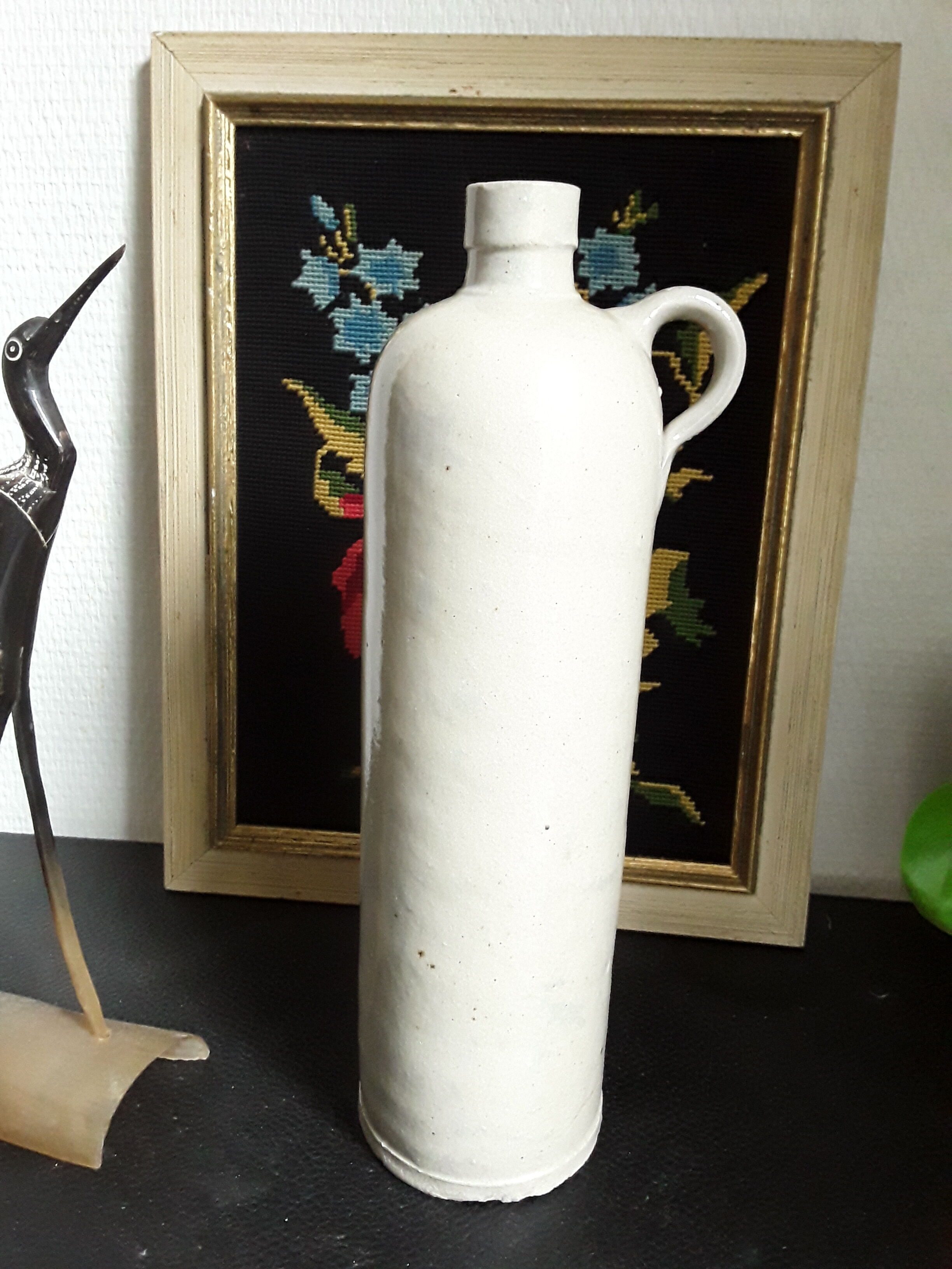 Vintage glazed stoneware bottle with handle