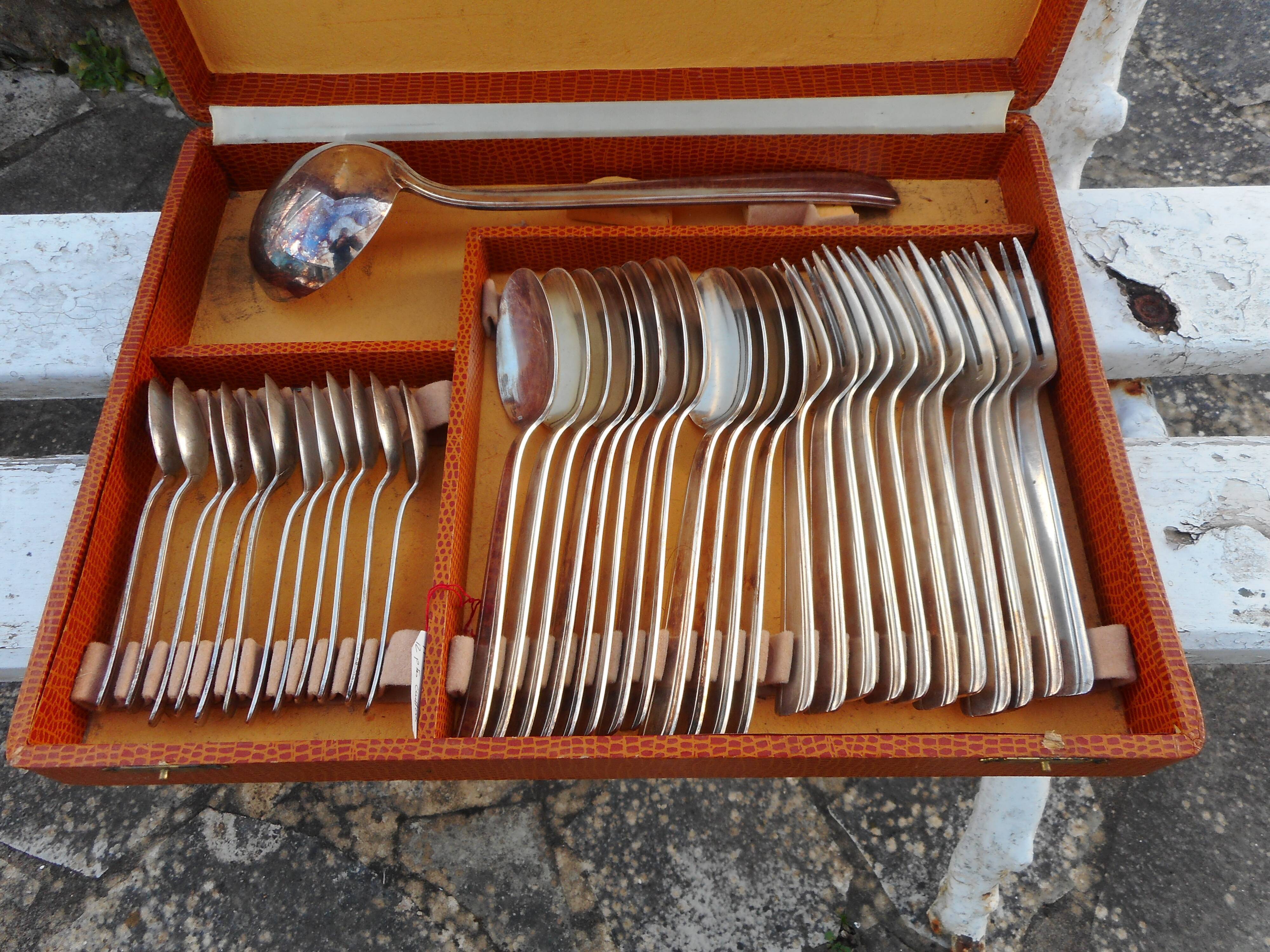 Box with silver metal housewife