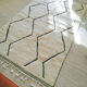 Magnificent Berber carpet Béni Ouarain green and white with diamonds and braided border
