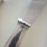 Serving cutlery in silver metal