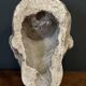 Antique plaster sculpture of a female face from the early 20th century