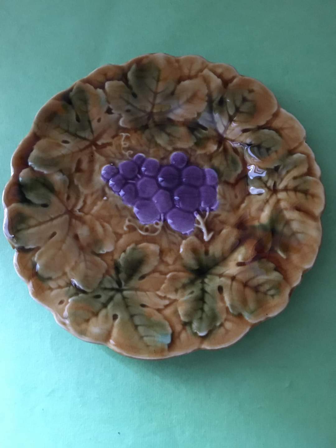 3 slip dessert plates stamped Sarreguemines. Fruit decor.