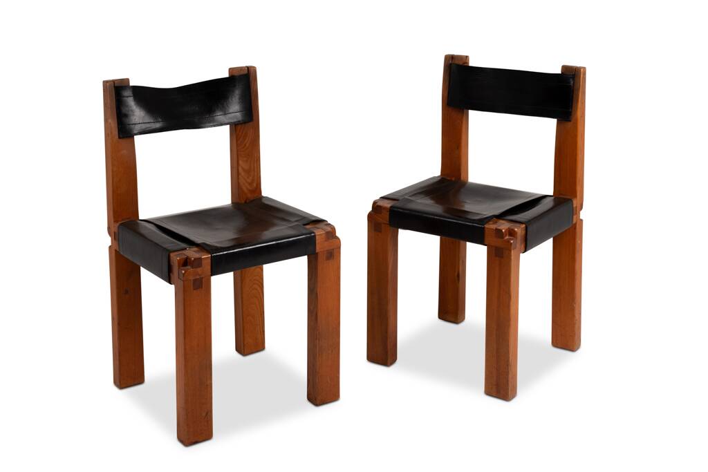 Pierre Chapo. Series of 8 "S11" chairs in elm and leather. 1960s-70s.