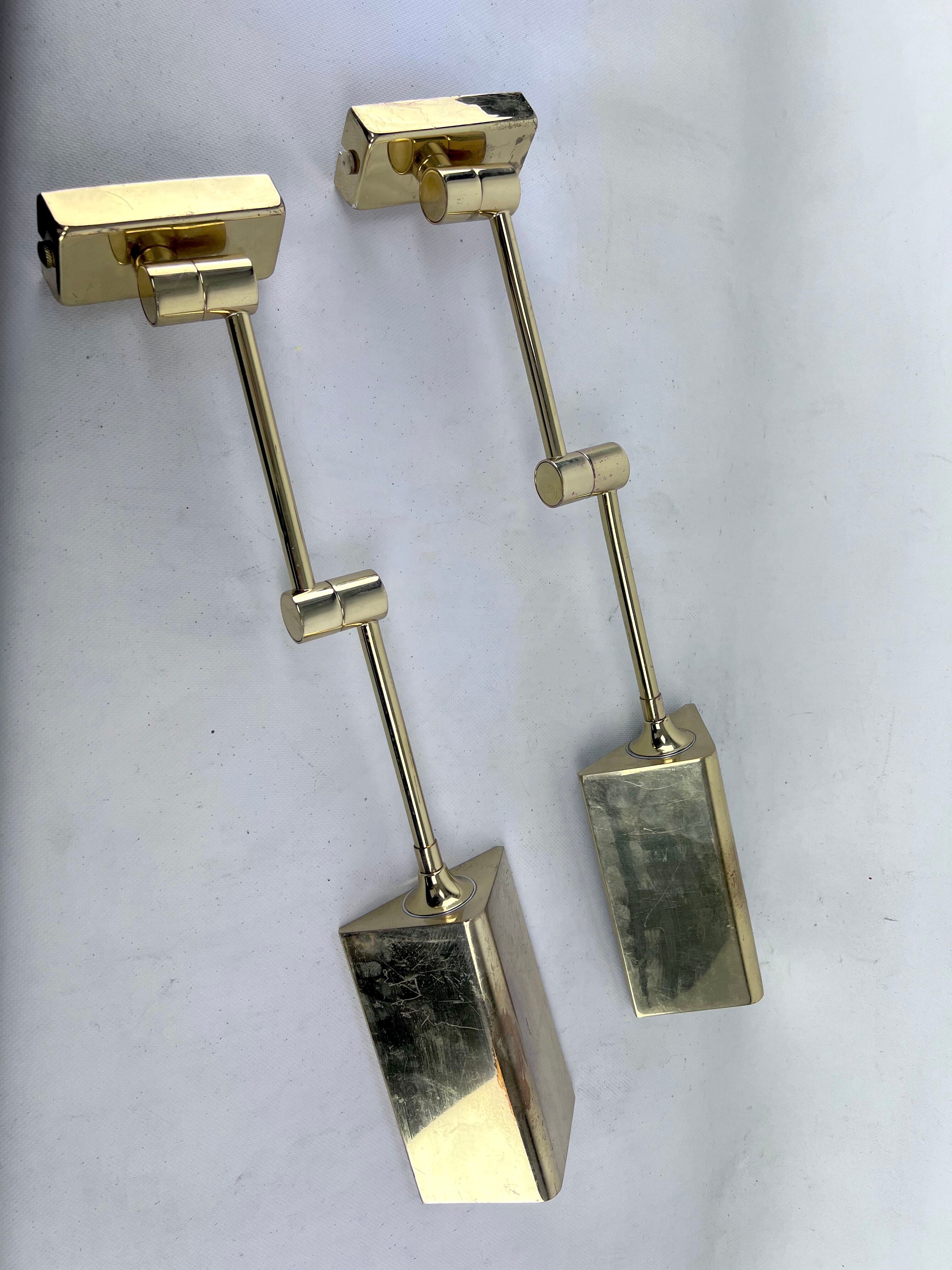 Postmodern pair of articulated brass wall lamps by Baulmann Leuchten. Germany 1980s