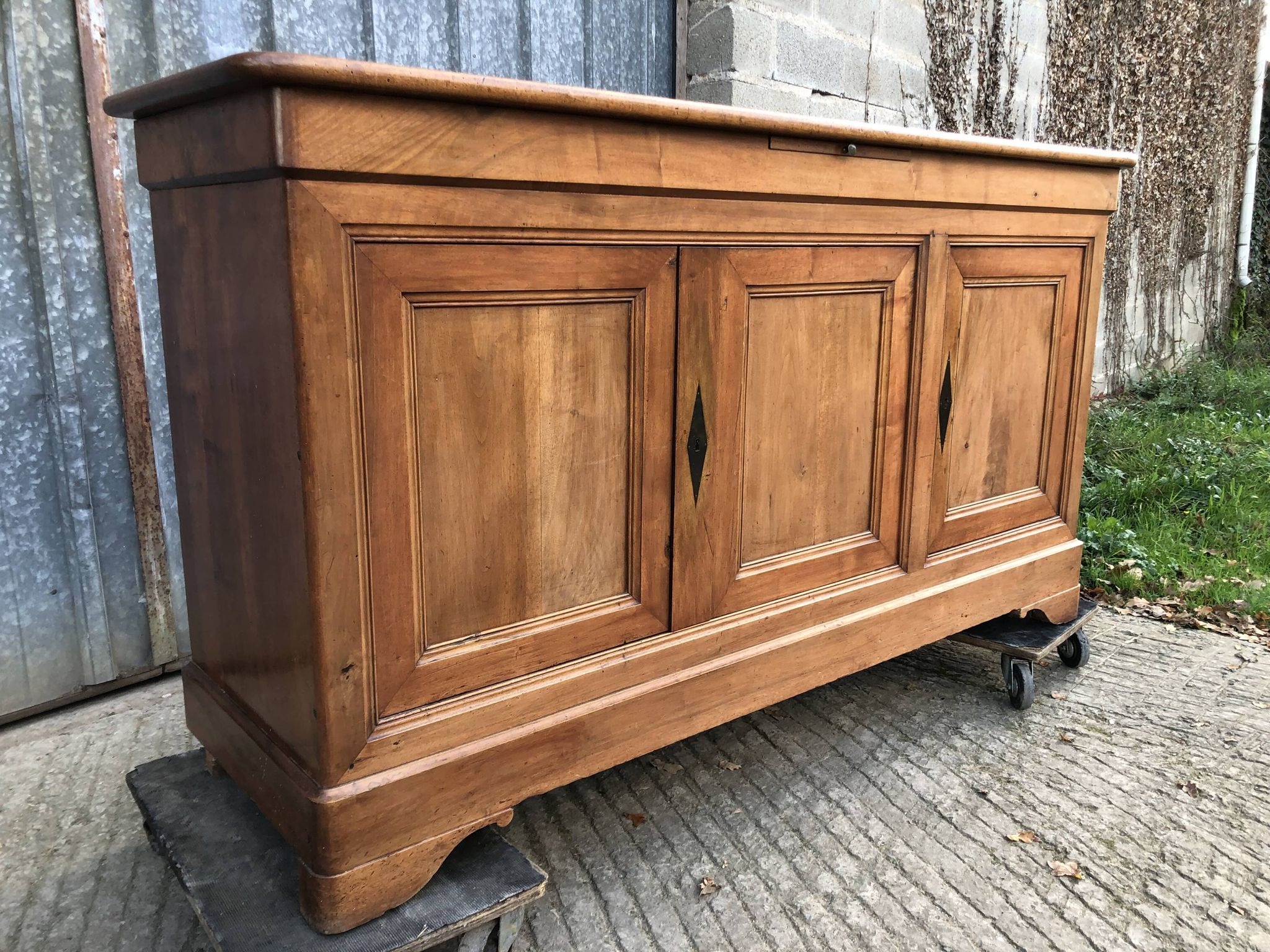 Louis Philippe style sideboard in solid walnut with 3 doors and 1 pull-out shelf.