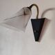1950s wall lamp, metal, flexible brass stem and opaque shade.