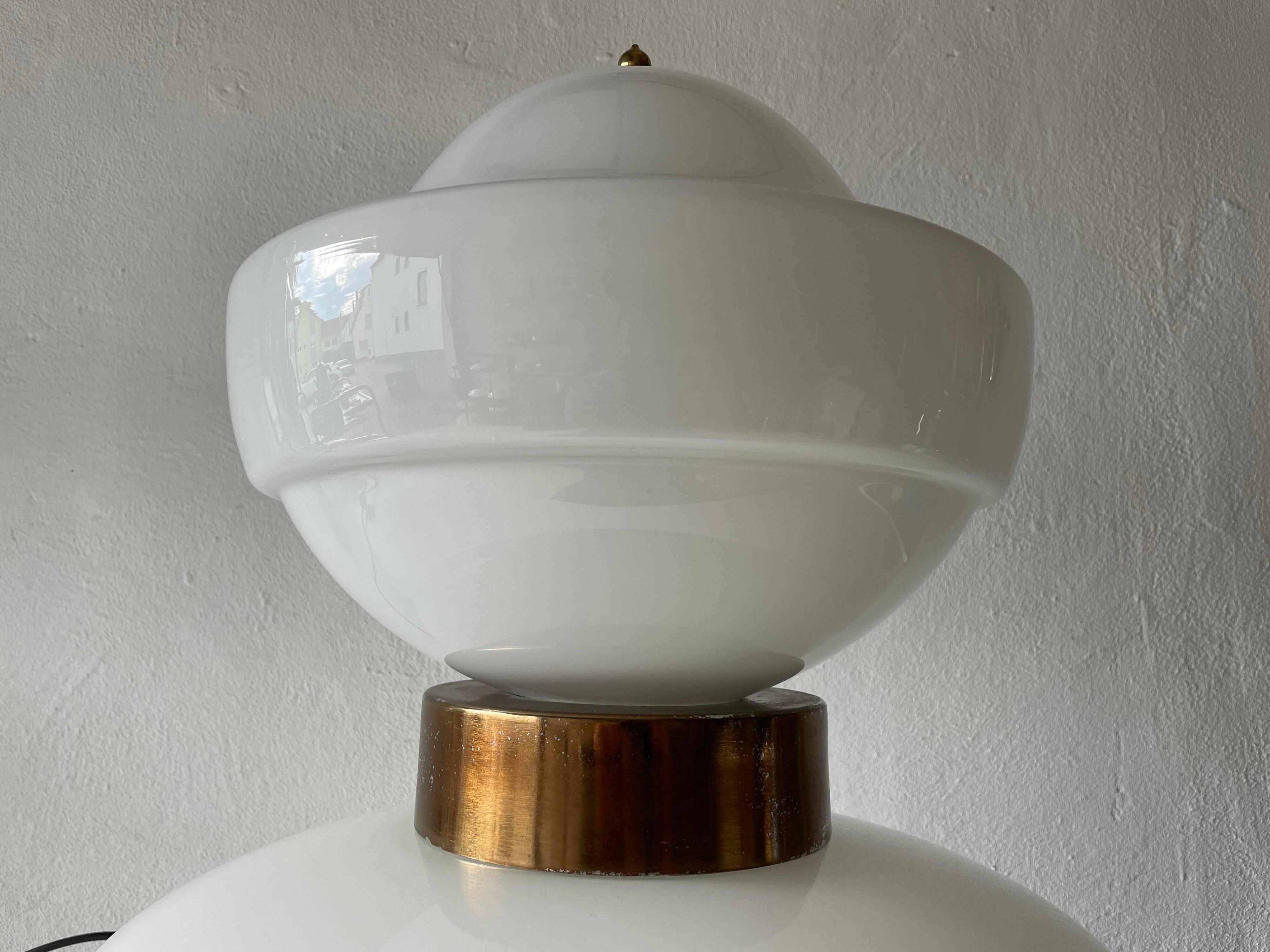 Large table lamp or floor lamp in opal glass and brass body, 1960s, Italy.