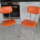 Duo of vintage chairs in orange skai