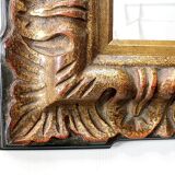 Gold-tinted wooden and stucco rectangular mirror - 1920