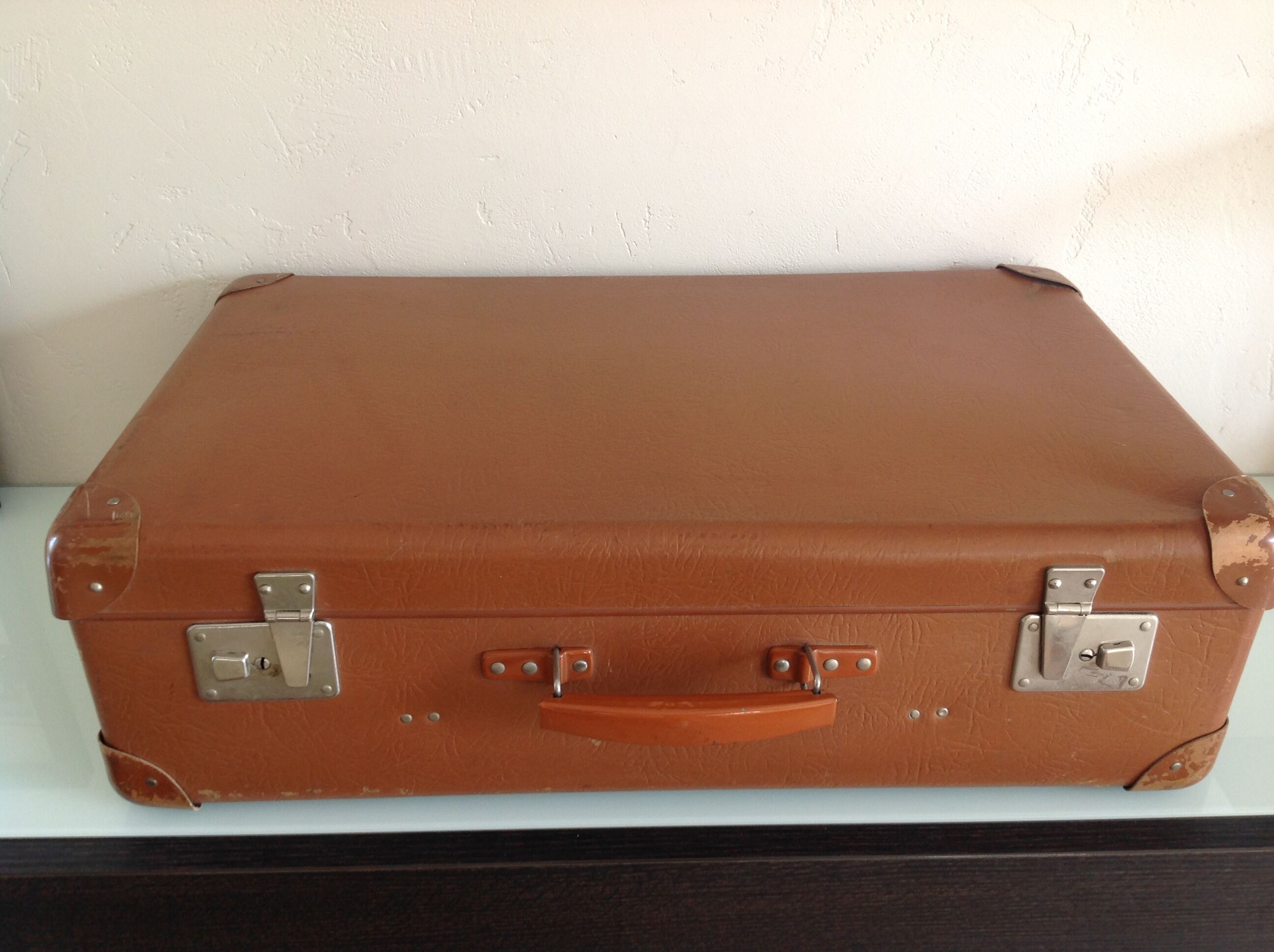 Light brown vintage suitcase