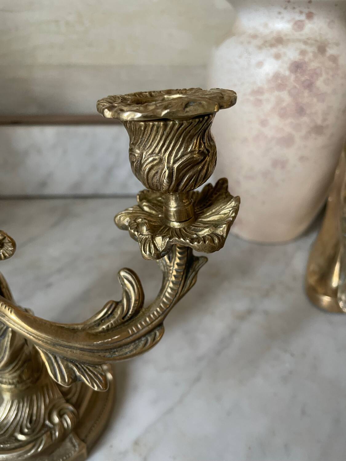 Pair of rocaille candlesticks in gilded bronze